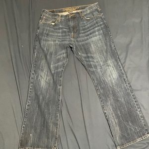 Dark wash men’s AE original boot style jean sz 34x32